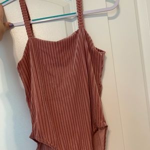 Never worn velvet pink striped bodysuit
